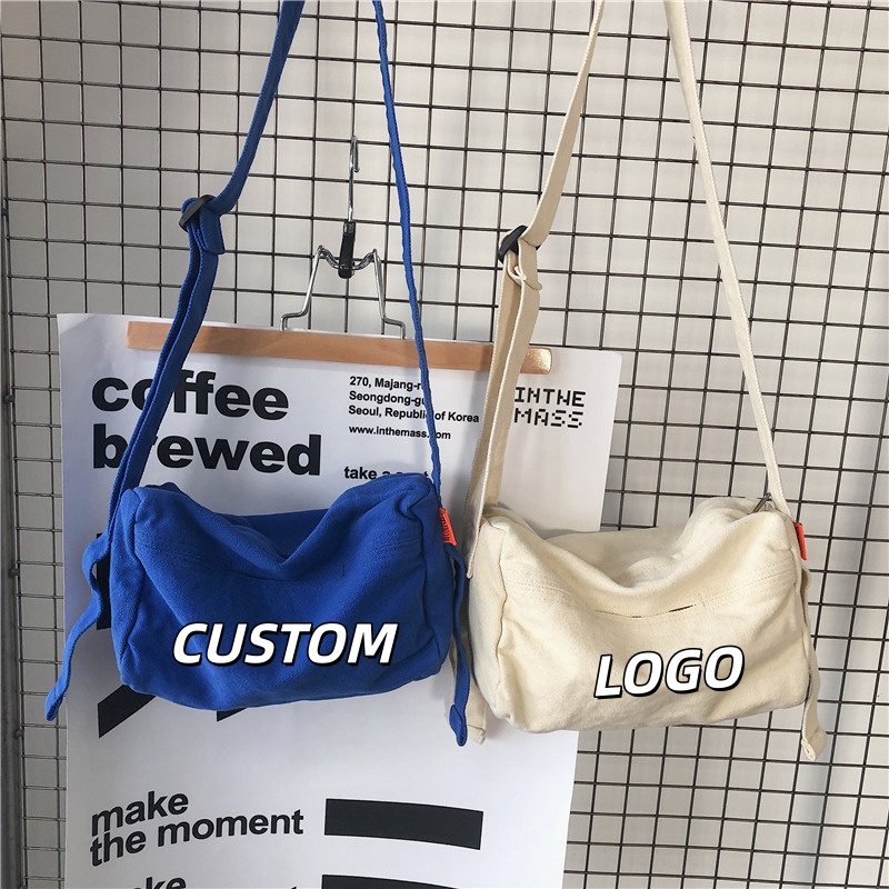 Women Bags Logo - กระเป๋าผ้าแคนวาสสะพายข้างสำหรับนักเรียน พิมพ์โลโก้ได้ สายสะพายปรับได้ กระเป๋าสะพายไหล่ขนาดใหญ่ ใส่ของได้เยอะ สำหรับไปโรงเรียนและเดินทาง